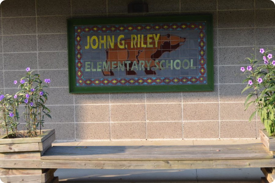 brick wall with sign